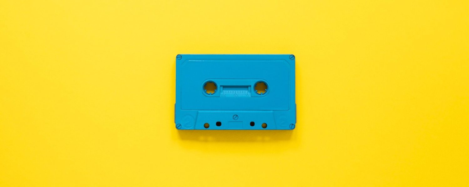 Radio concept with cassette yellow background 23